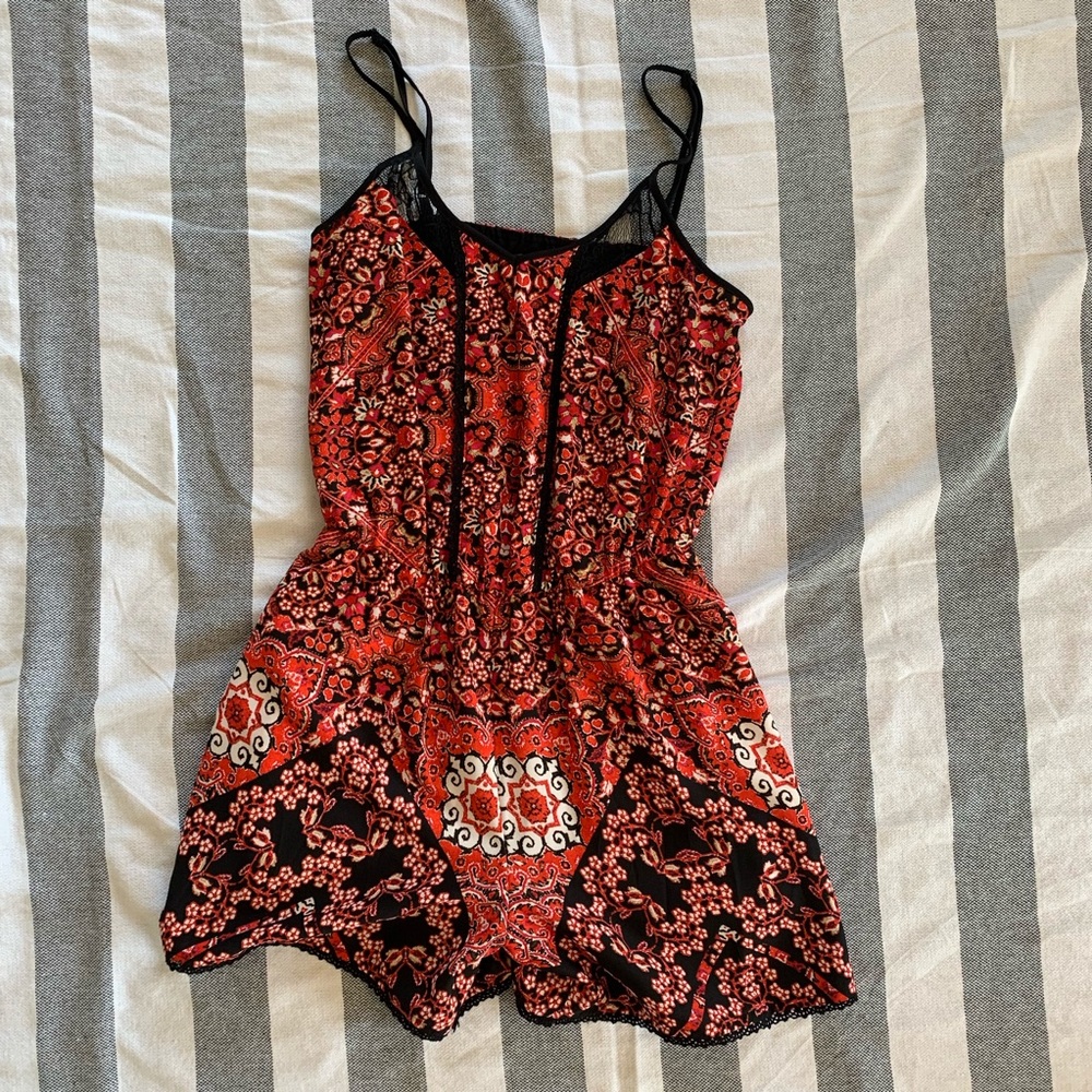 RED PATTERNED ROMPER